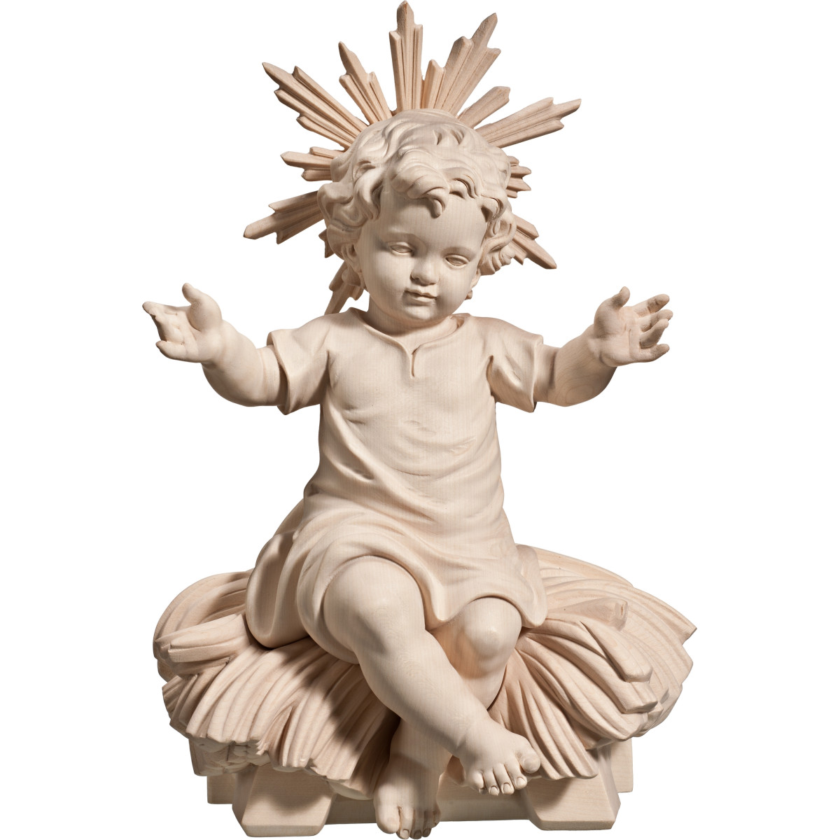 Niño Jesús vestido sentado en cuna